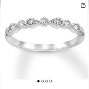 White gold, diamond and London blue tooled engagement ring. Brand new!